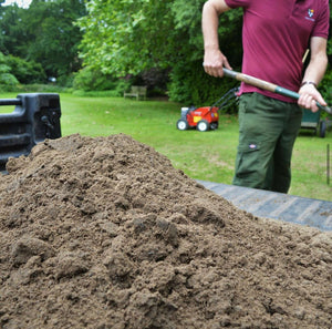 Top Dressing being spread onto lawn to Christchurch