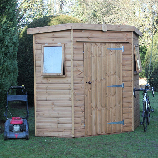 garden shed apex corner, with bike and mower, wide side shot