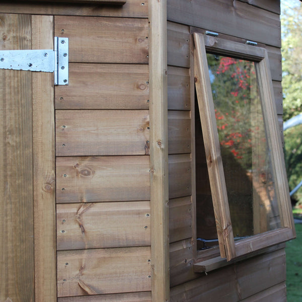 garden shed apex corner, showing hinge and right window