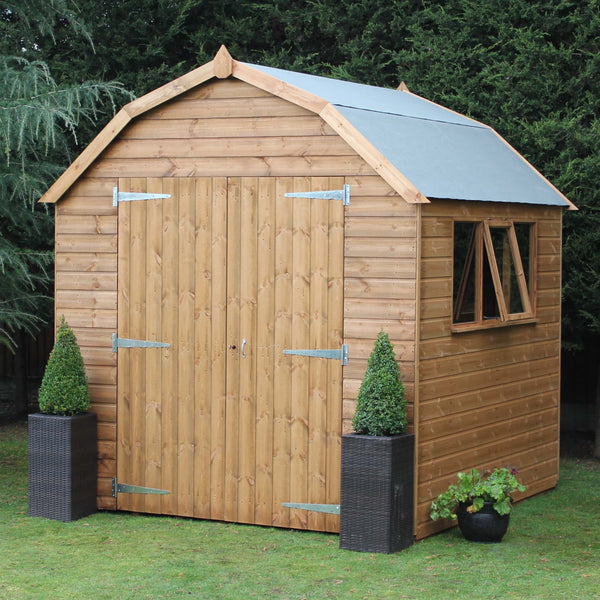 dutch barn shed with plants